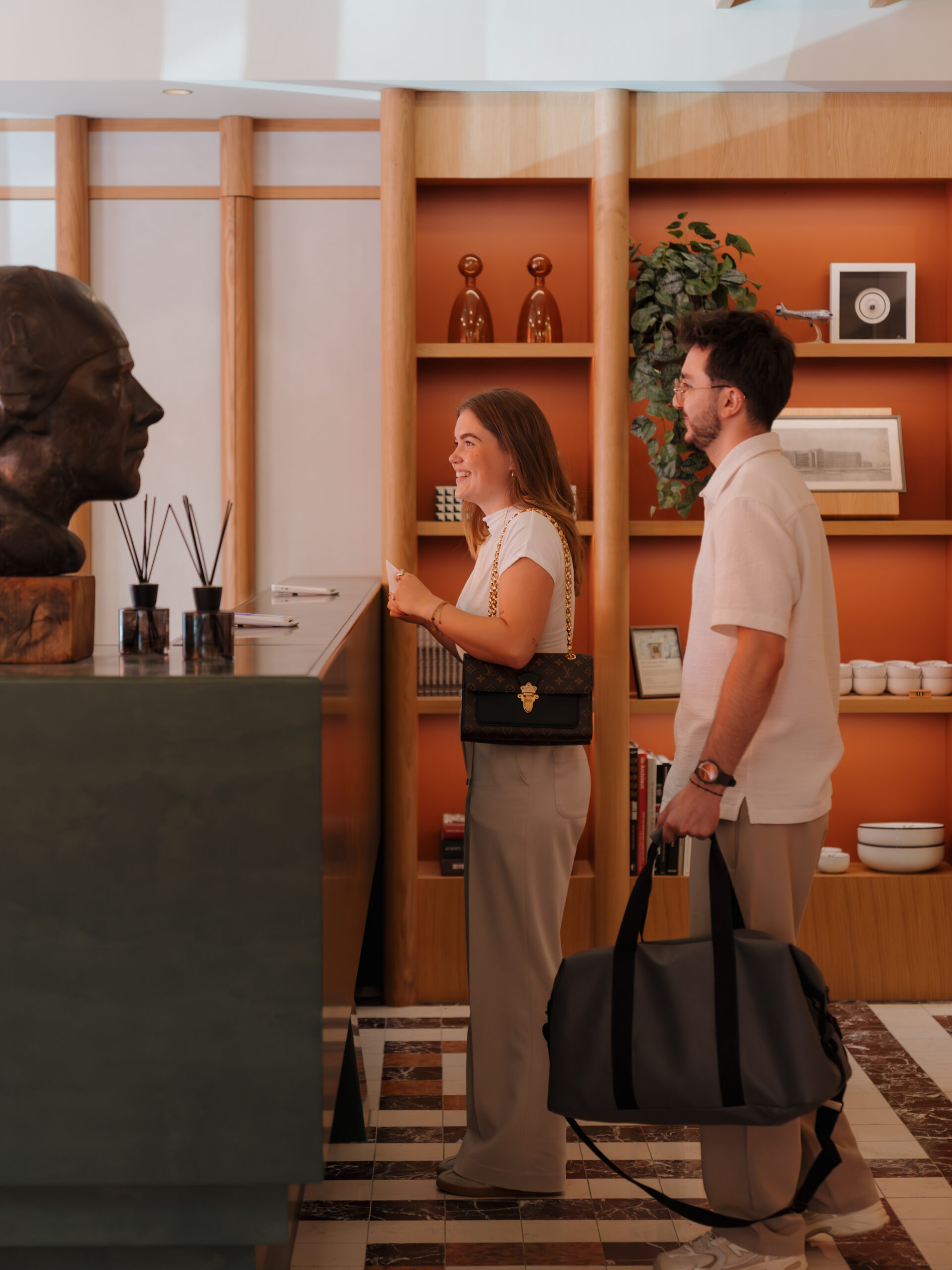 Guests checking in De Plesman Hotel in The Hague